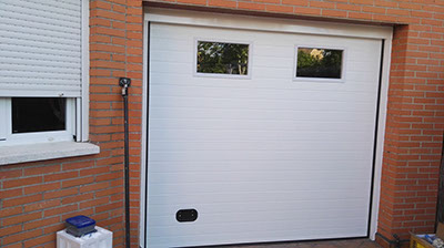 PUERTA SECCIONAL CON DISE+æOS INDIVIDUALIZADOS (5)